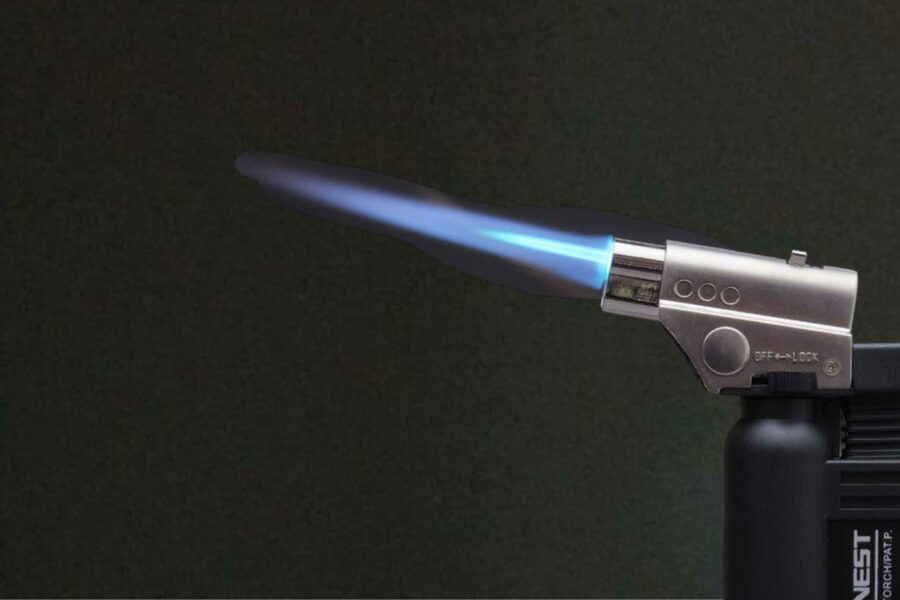 Image of a torch lighter being fired